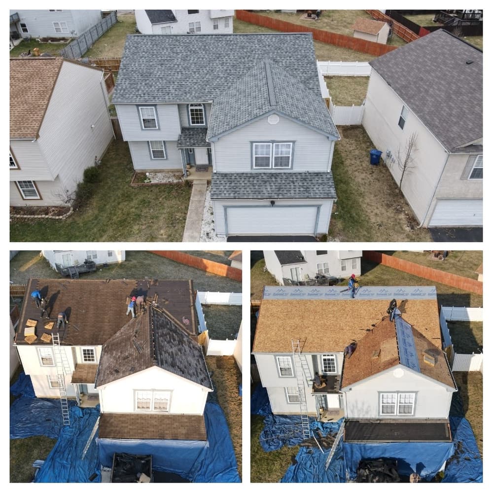Aerial view of a house undergoing roof replacement with workers and tarps.